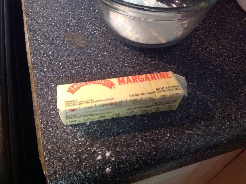 Take 6 tablespoons of butter or margarine which every you prefer and put into a pot big enough for everything to be combined in....