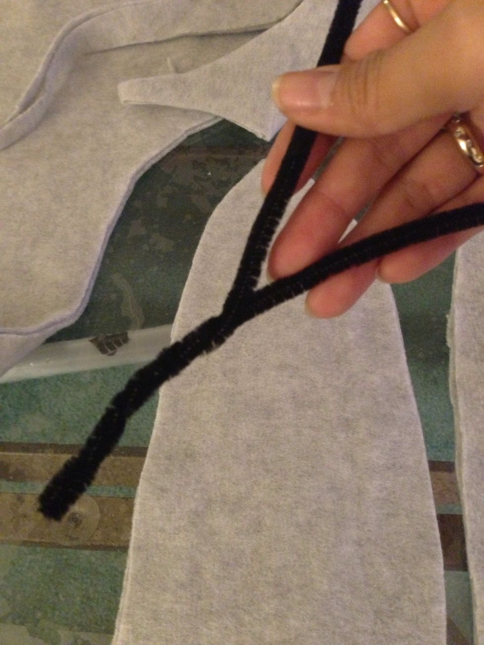 Take 8 stems out and I didnt feel like one alone was tough enough so im taking two and twisting them together like so