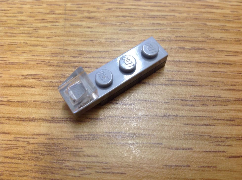 Take a 1x4, a 1x3, and a clear cheese piece. Connect.