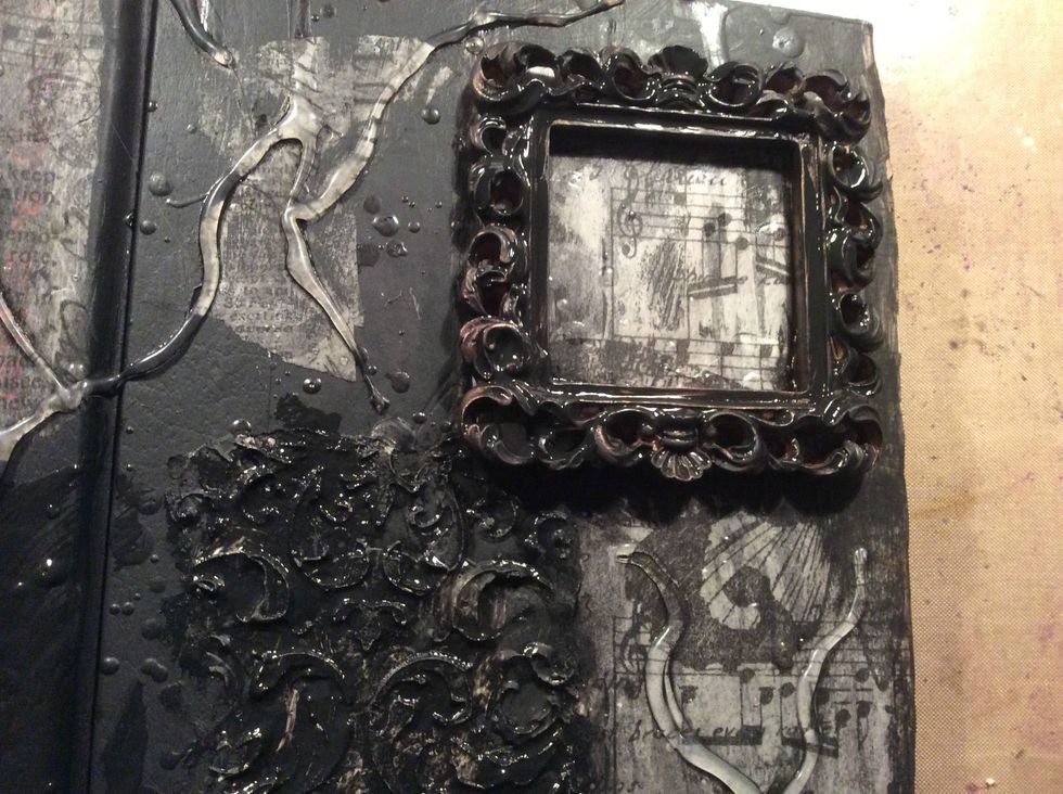 Take a baby wipe and remove some of the gesso over the tissue paper so it is exposed.