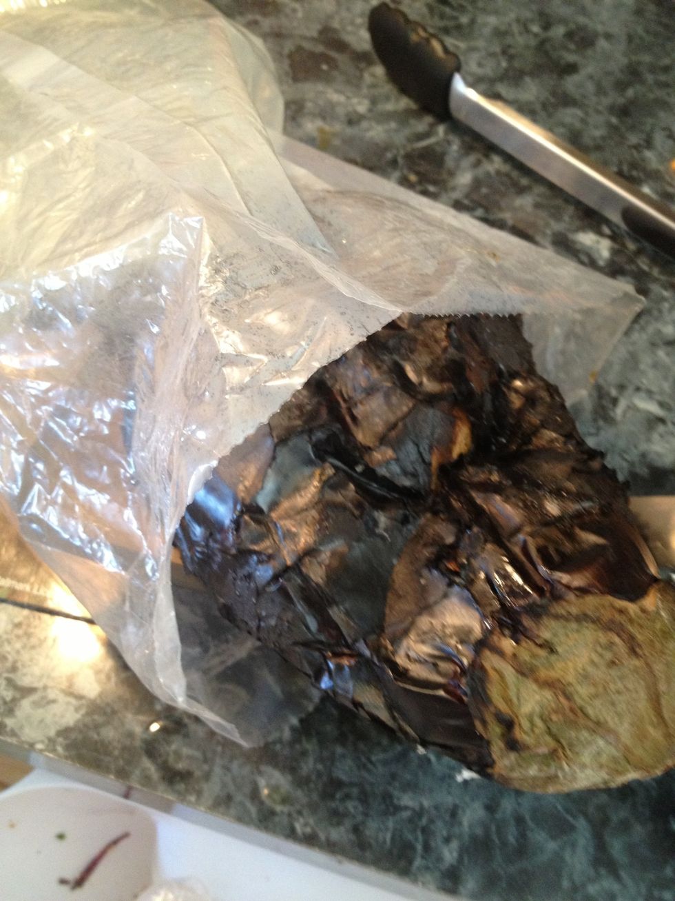 Take a bag and insert the eggplant in it.