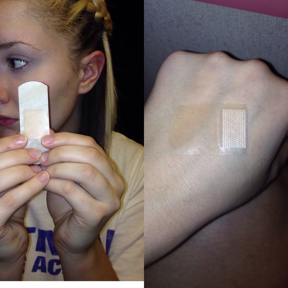 Take a bandaid (or tape) cut it in half and place on the back of your hand, pull it off a couple times so it becomes less sticky.