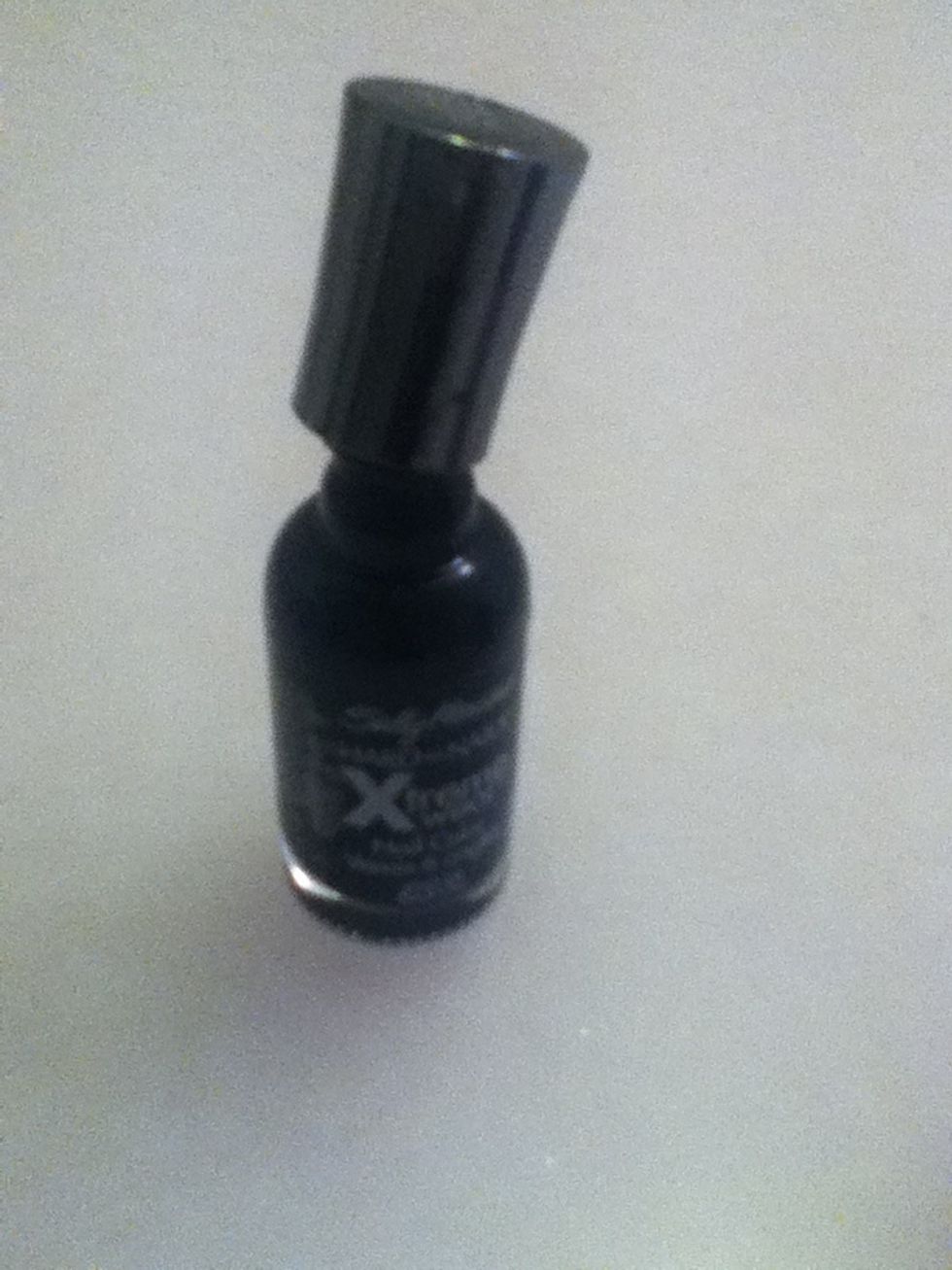 Take a black nail polish (I guess you could use any color...BUT MAKE SURE IT'S OPAQUE!)