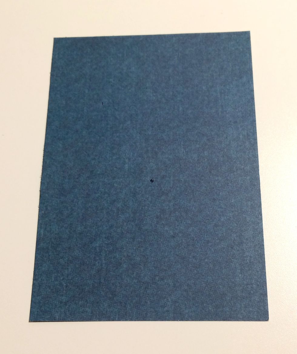 Take a blue piece of paper out of the patterns & solids paper. Cut a piece that measures 2 3/8" x 3 1/2".
