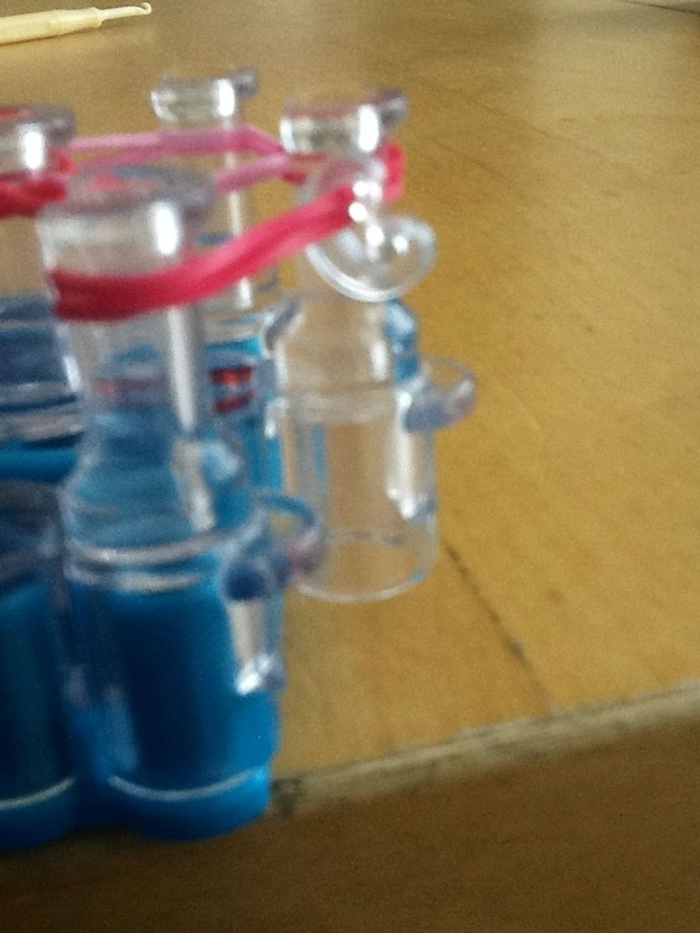 Take a c-clip and hook it onto the last band. ( Sorry for the bad pic.)