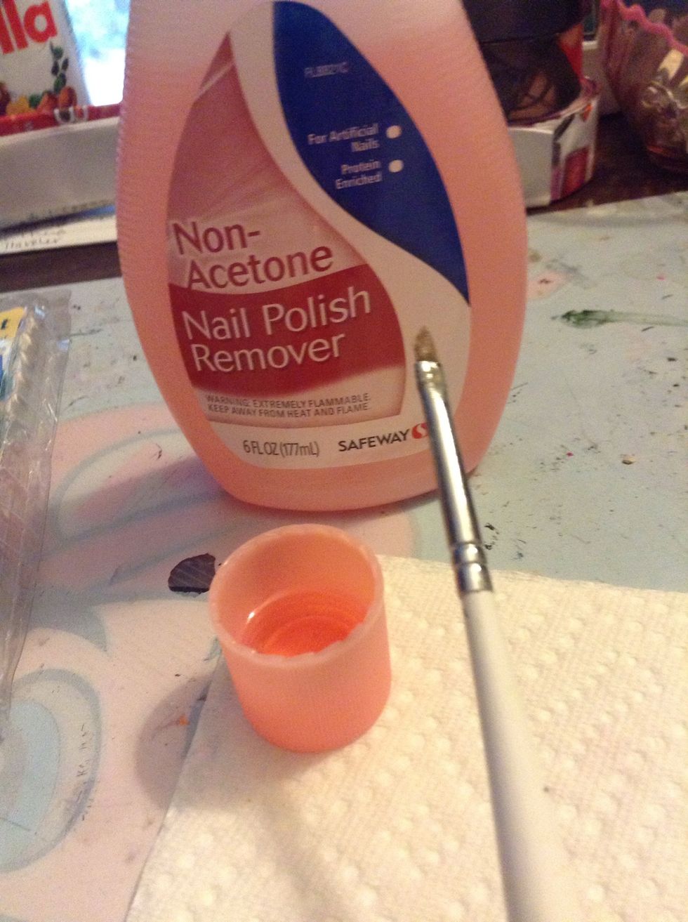 Take a cap of polish remover and use a small brush or q-tip and clean up the skin around your nails.