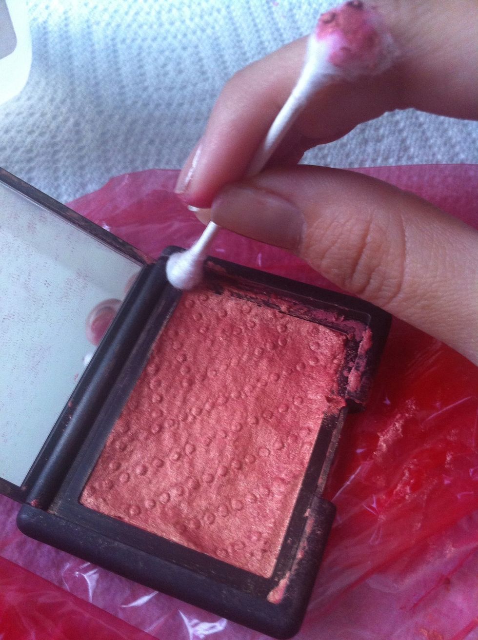 Take a cotton swab and clean the edges. (My paper towel left a little design)