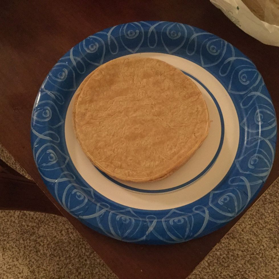 Take a couple tortillas and cut them into 6 triangles