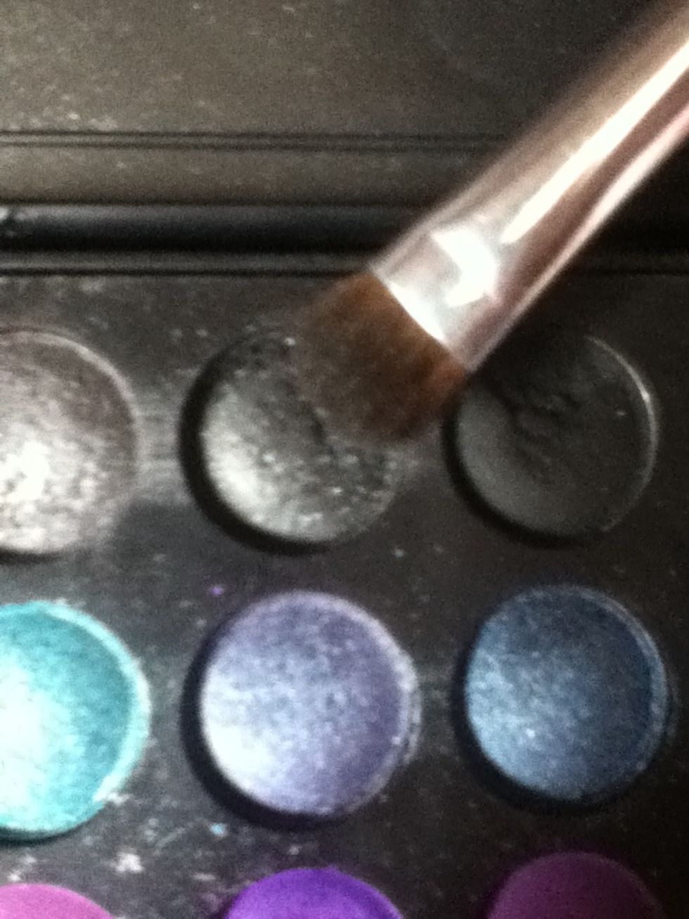 Take a dark, sparkly silver eyeshadow.