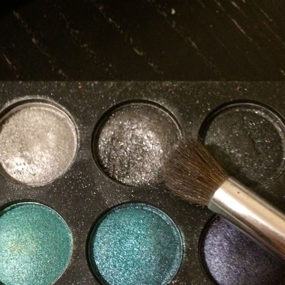 Take a darker silver on a fluffy brush...