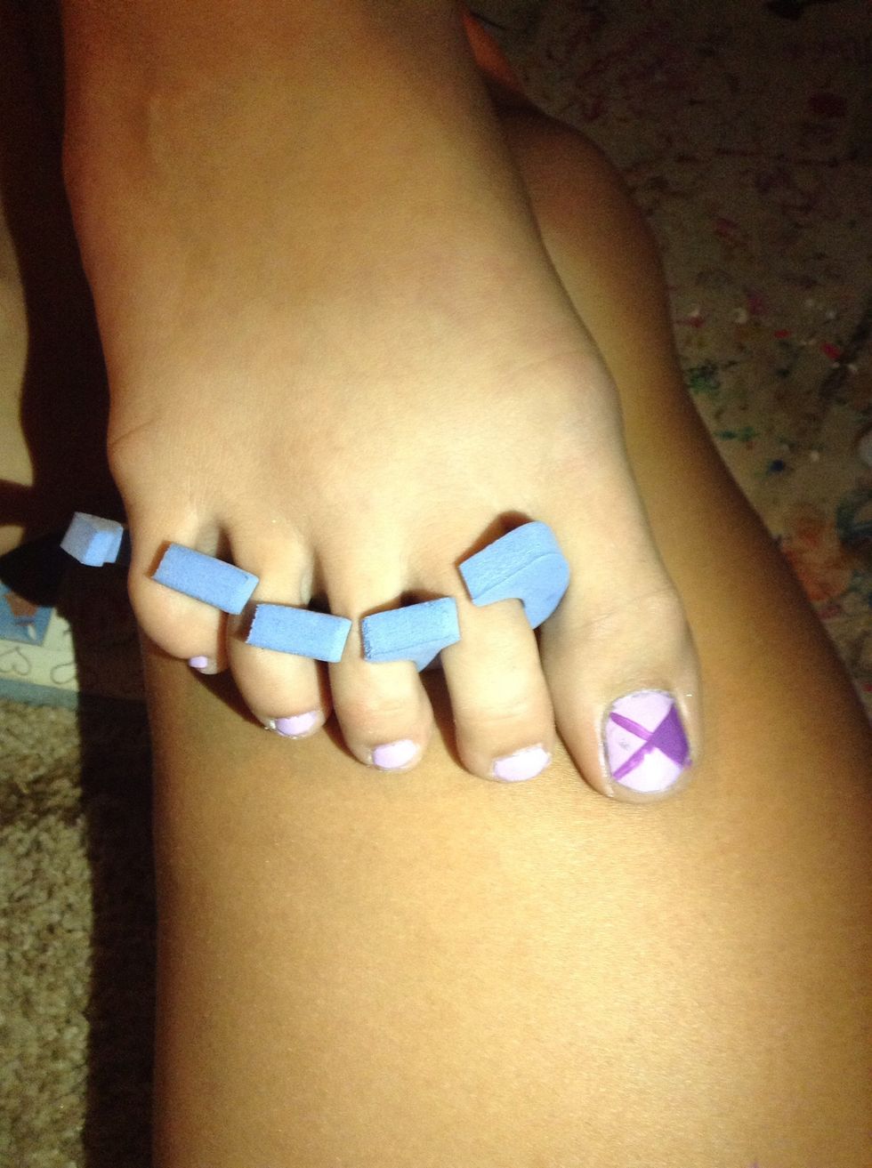 Take a darker version of your base coat and make an X on your nail. And fill in on the outside sections. ( forgot to take a pic before filling in )