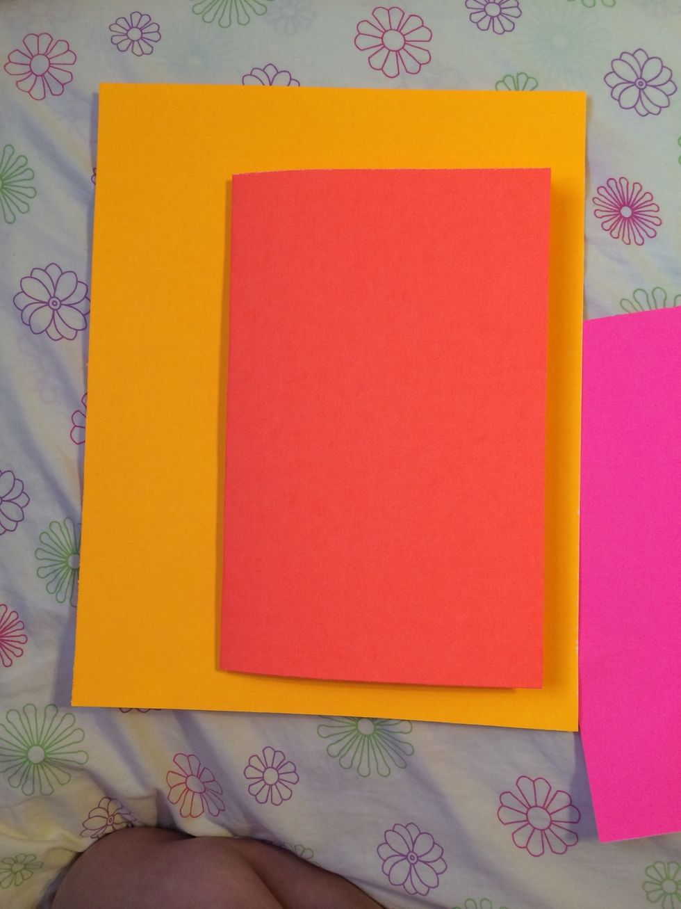 Take a different piece of paper and fold it in half.