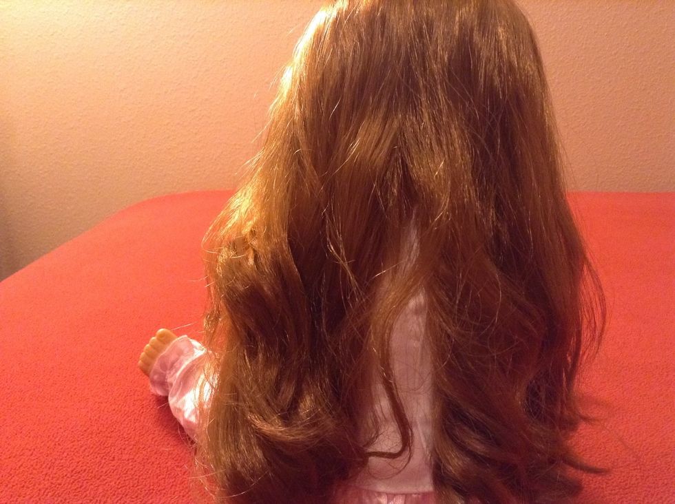 Take a doll or someone with long hair to braid on, I chose a doll.