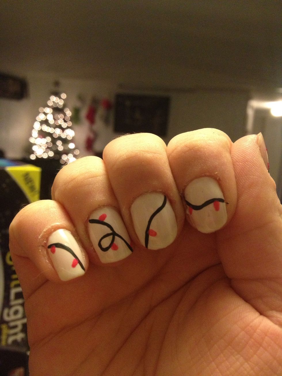 Take a dotting tool or small paint brush and gently create little lights. You can even just take a toothpick or dotting tool and place dots as your lights :)