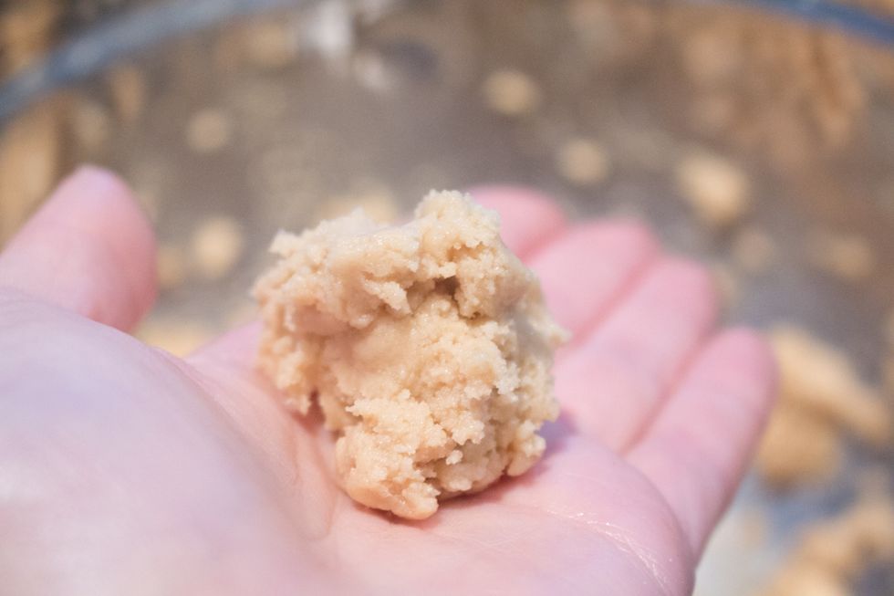 Take a drop of cookie dough in your hand