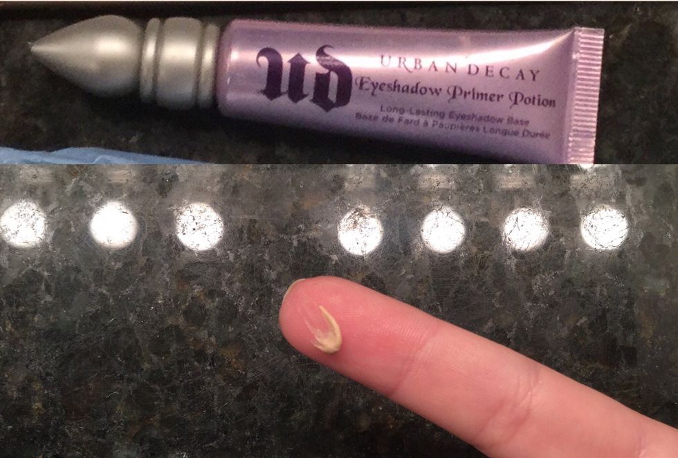 Take a drop of your eyeshadow primer and rub it all over your eyelid using your ring finger.