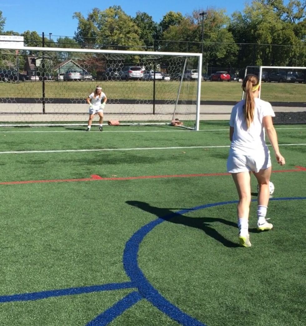 Take a few running steps towards the ball.