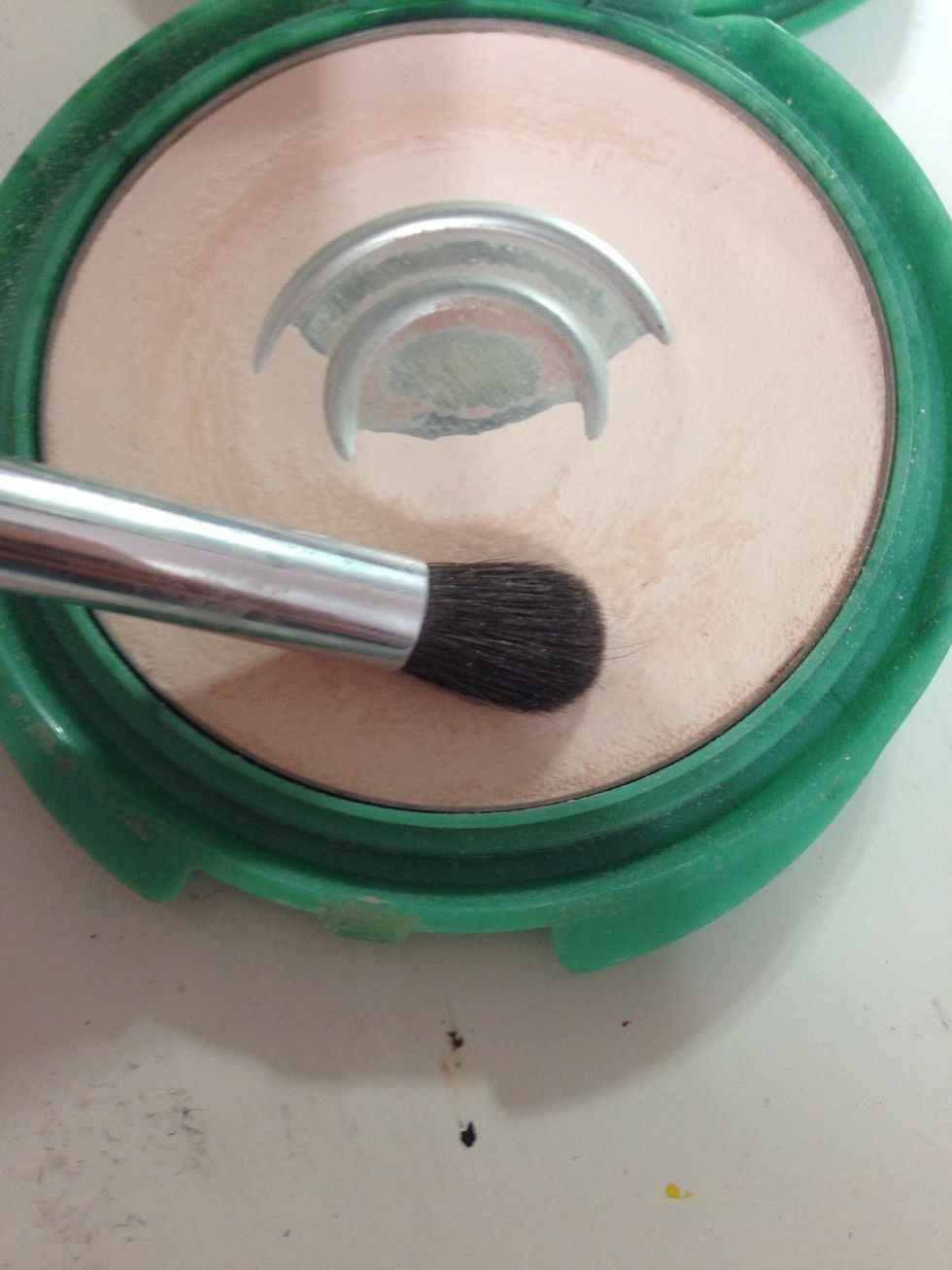 take a fluffy blending brush
