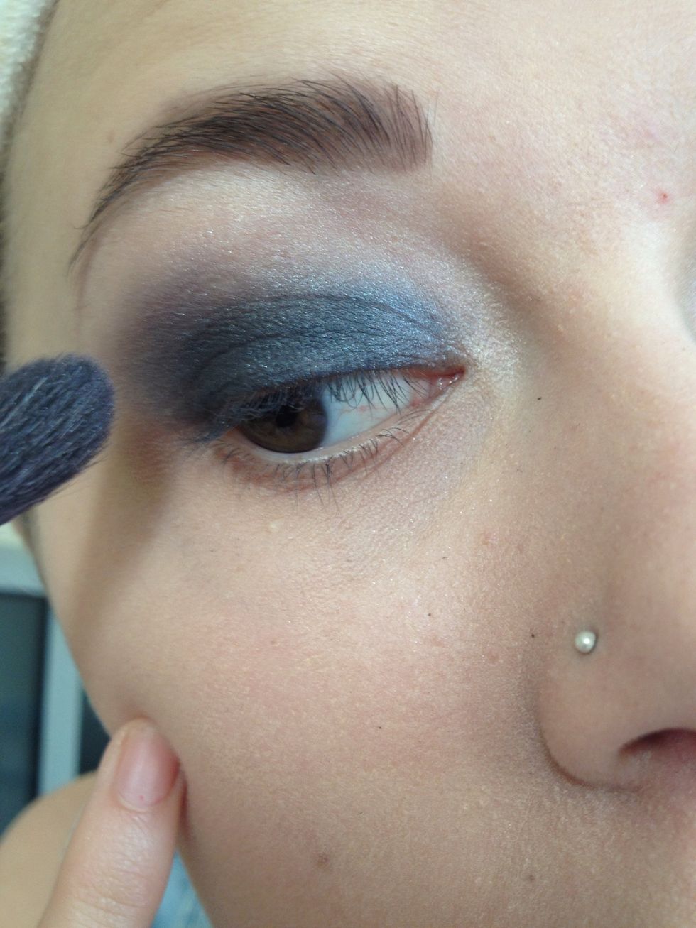 Take a fluffy brush and blend into the crease and pull the colour up to create a gradient effect