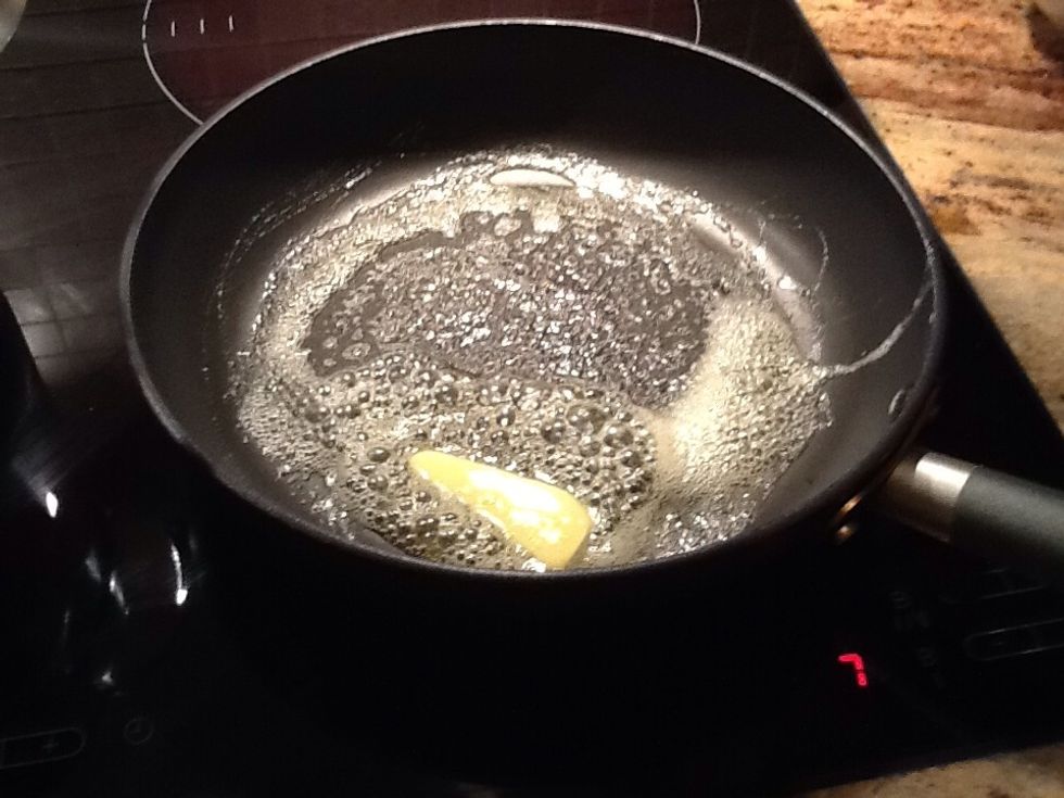 Take a frying pan and put a piece of butter in the pan, and when the butter has melted you pour in the batter