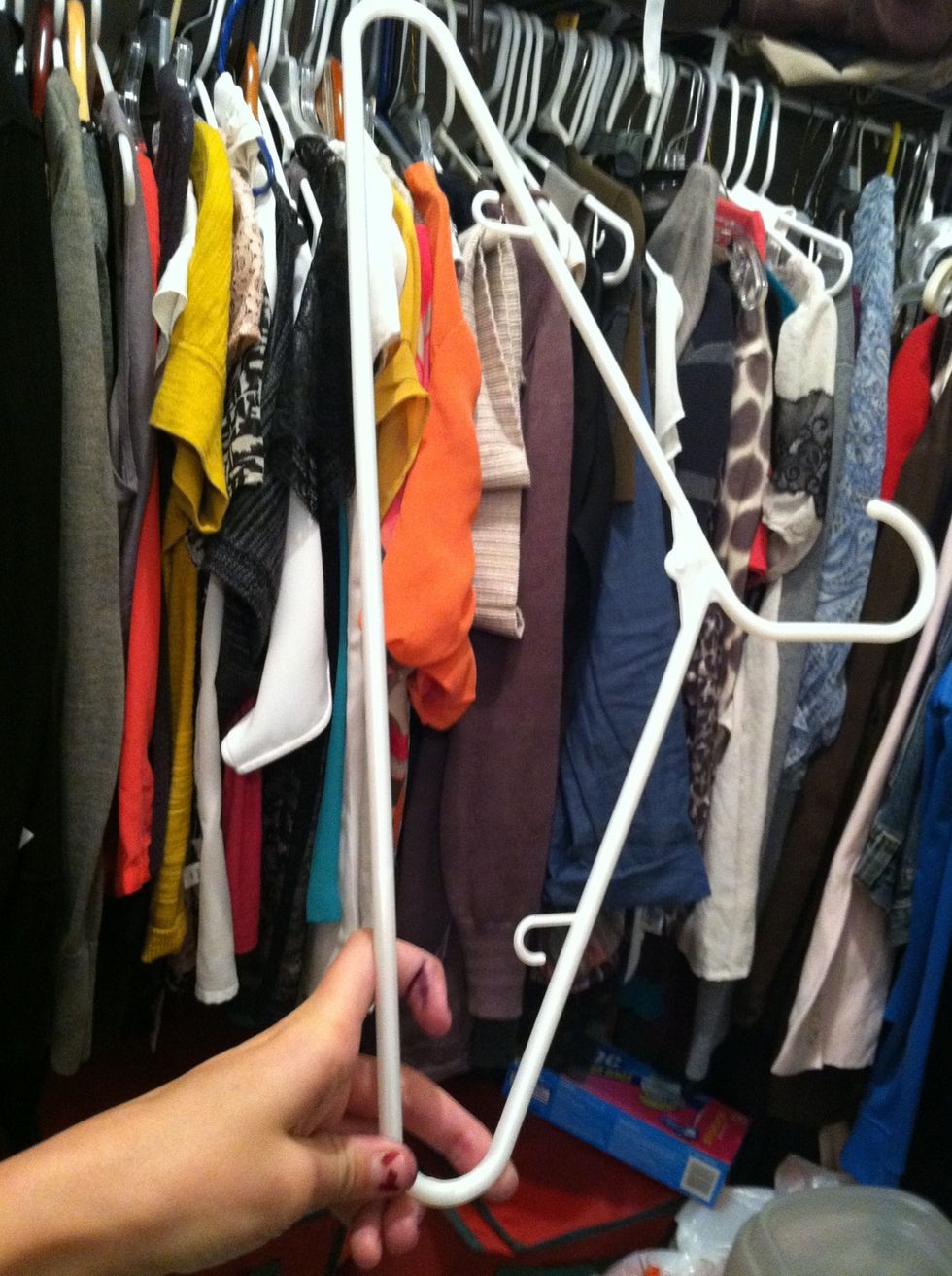 Take a hanger and cut it so you can get the lower portion of it isolated