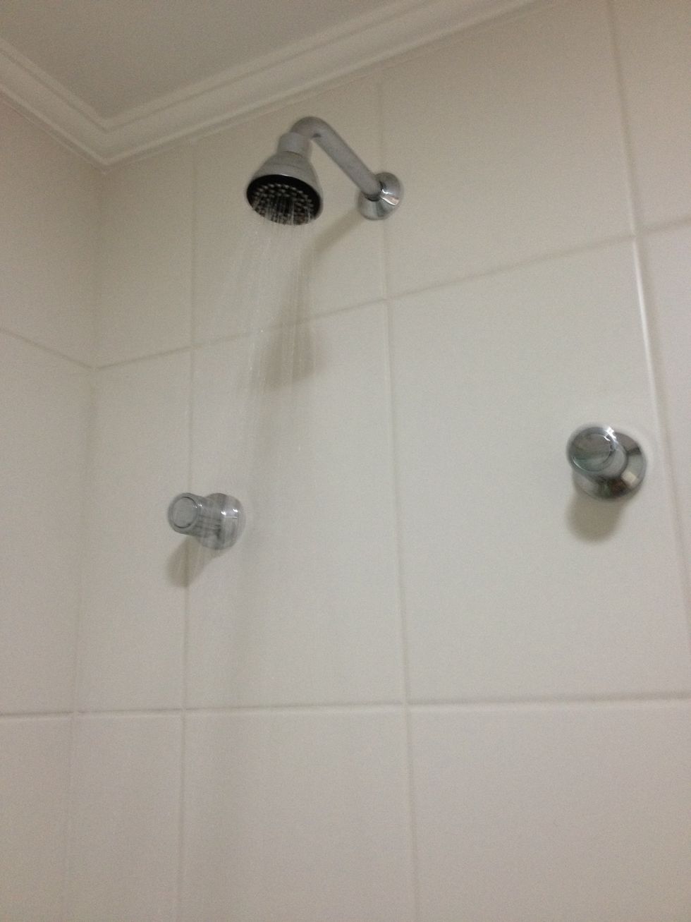 Take a hot bath, the cooling of your body will make you sleepy. Do it before bedtime.