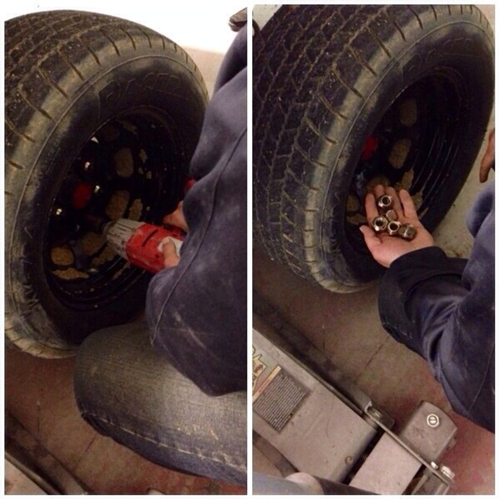 Take a impact wrench and take the lug nuts off the tire.