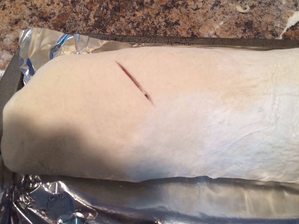 Take a knife and cut a few slits in the top.