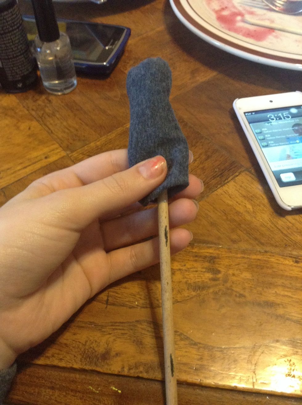 Take a knitting needle or pencil and shove it through the tube, until it goes all the way through