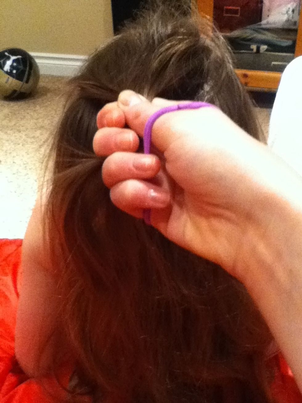 Take a large peice of hair of the top or your head