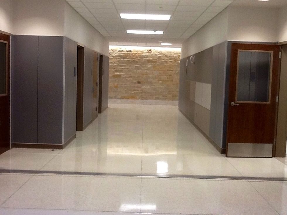 Take a left out of room 610. WALK to down the hall.