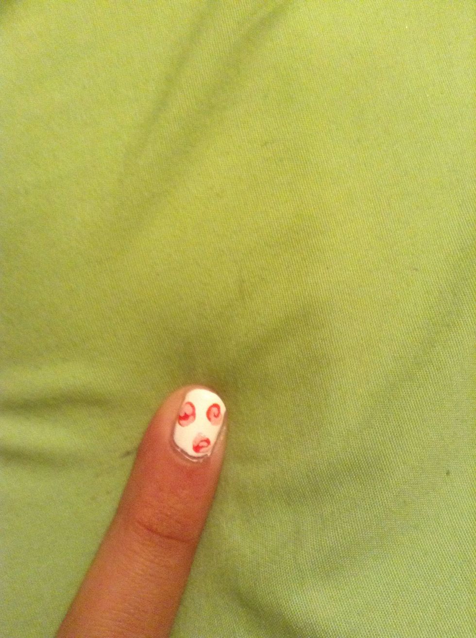 Take a lighter pink and sort of make the outline of the pedals on the flower, again doesn't have to be perfect lines.