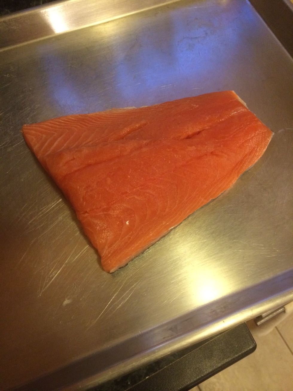 Take a nice piece of  salmon. Put it on a baking sheet.