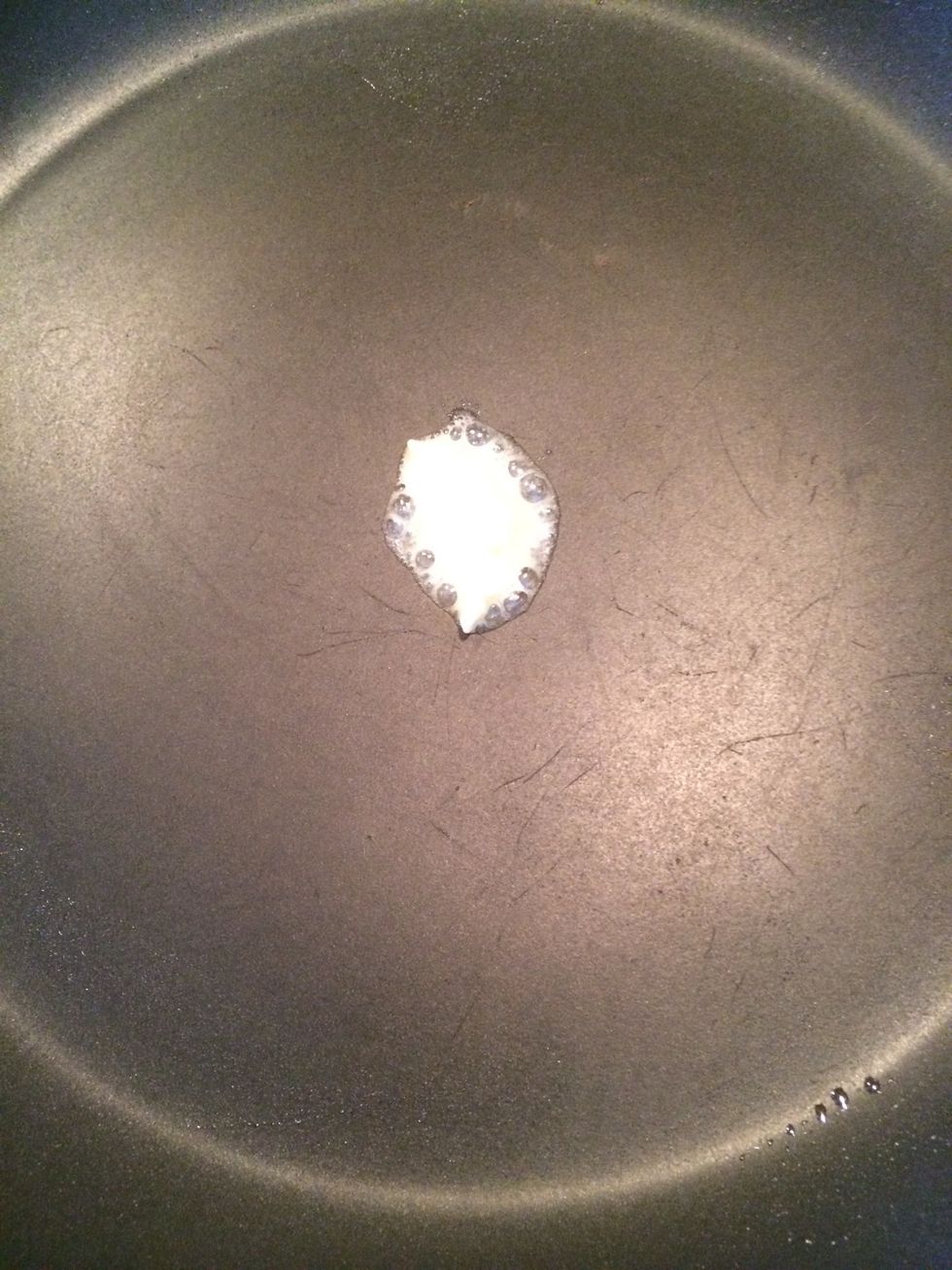 Take a non-stick pan and put it over medium heat. Put a small amount of butter in the hot pan