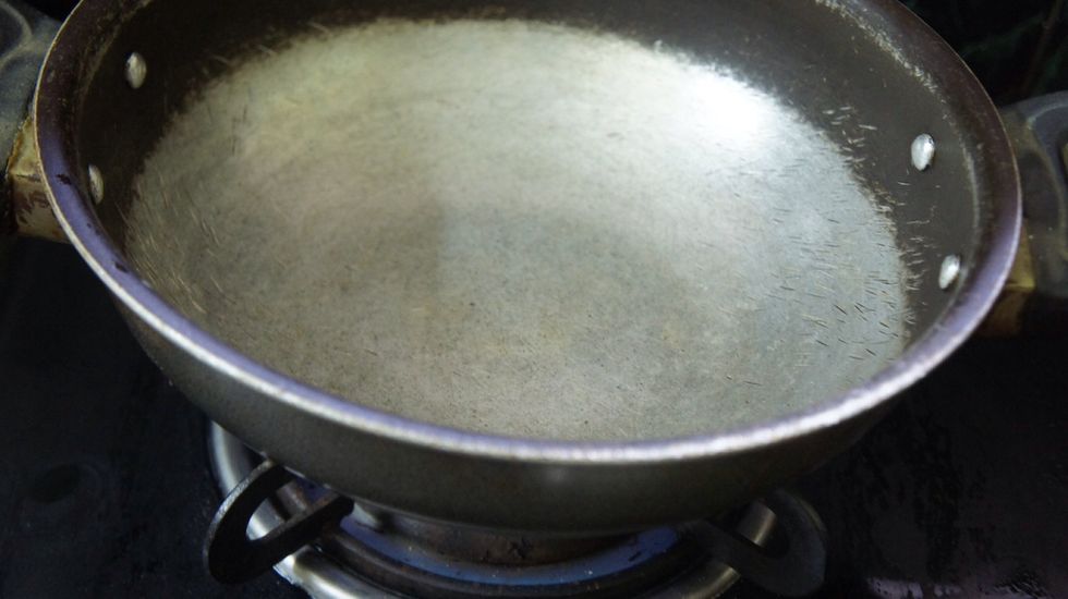 Take a pan and heat it