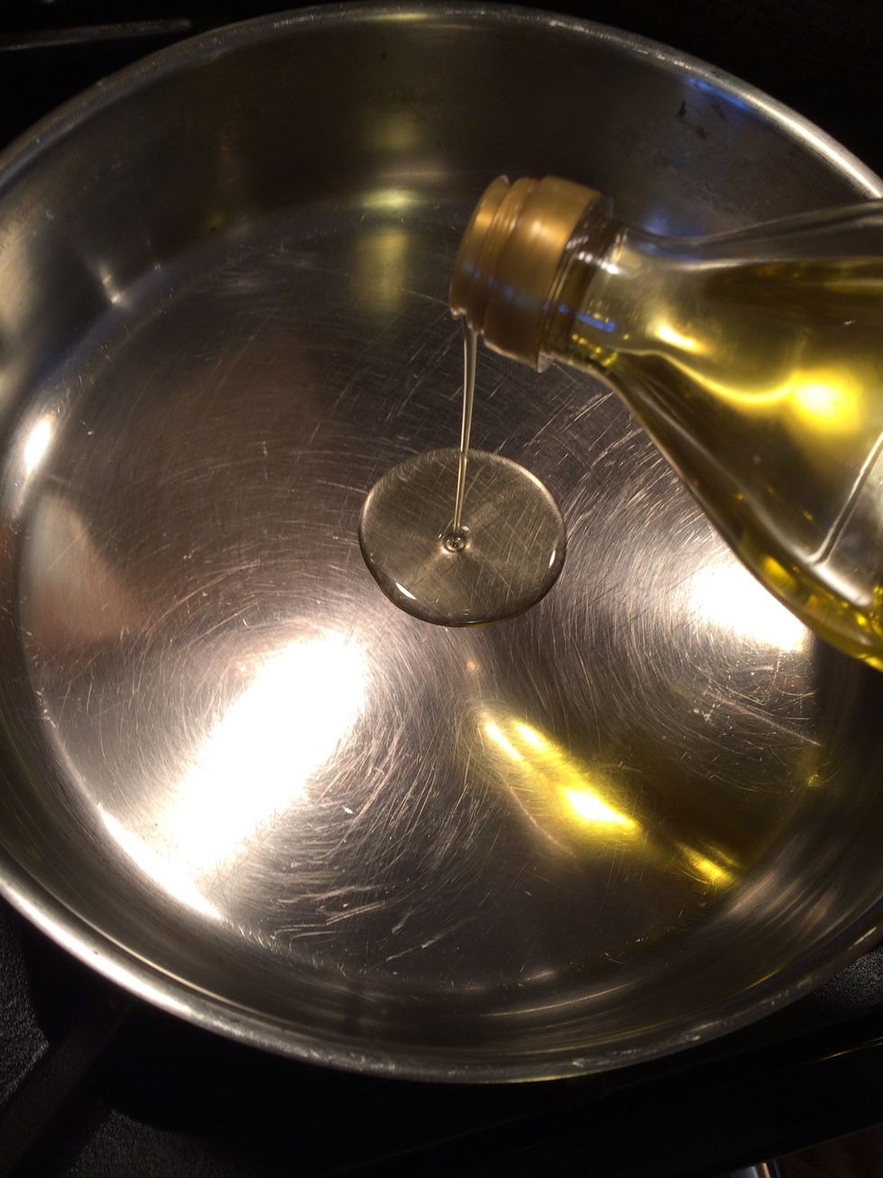 Take a pan and set it over medium heat. Add the olive oil