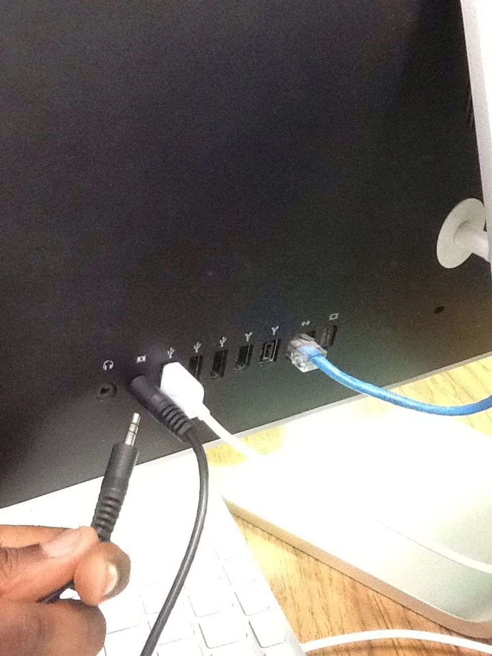 Take a patch cord and plug one end into the microphone jack and the other into the phone, MP3 player, etc. If your using a website or music off the computer, then the other end into the earphone jack.