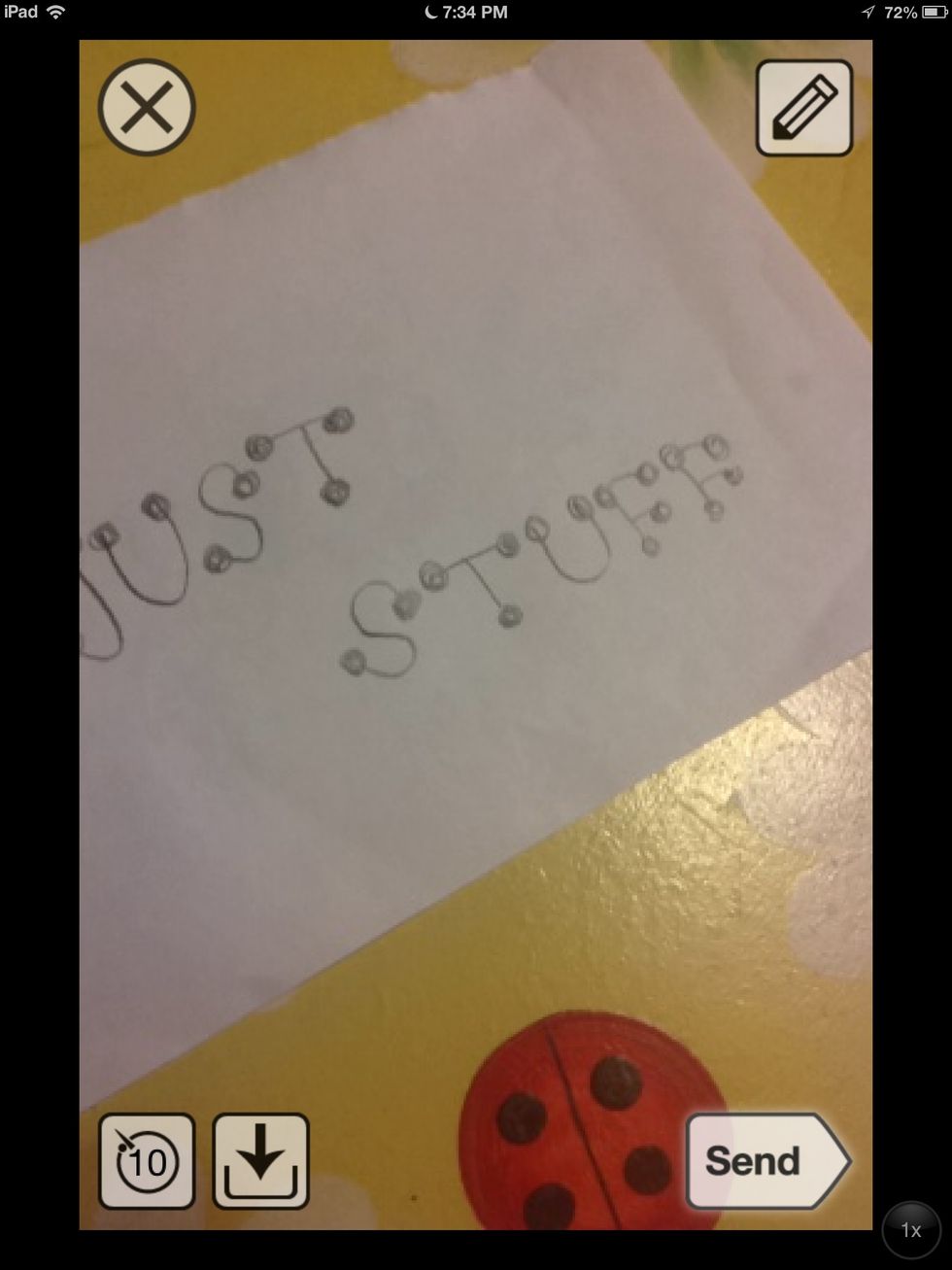 Take a photo of yourself or whatever you want to Snapchat. Next, tap the photo to add a caption.