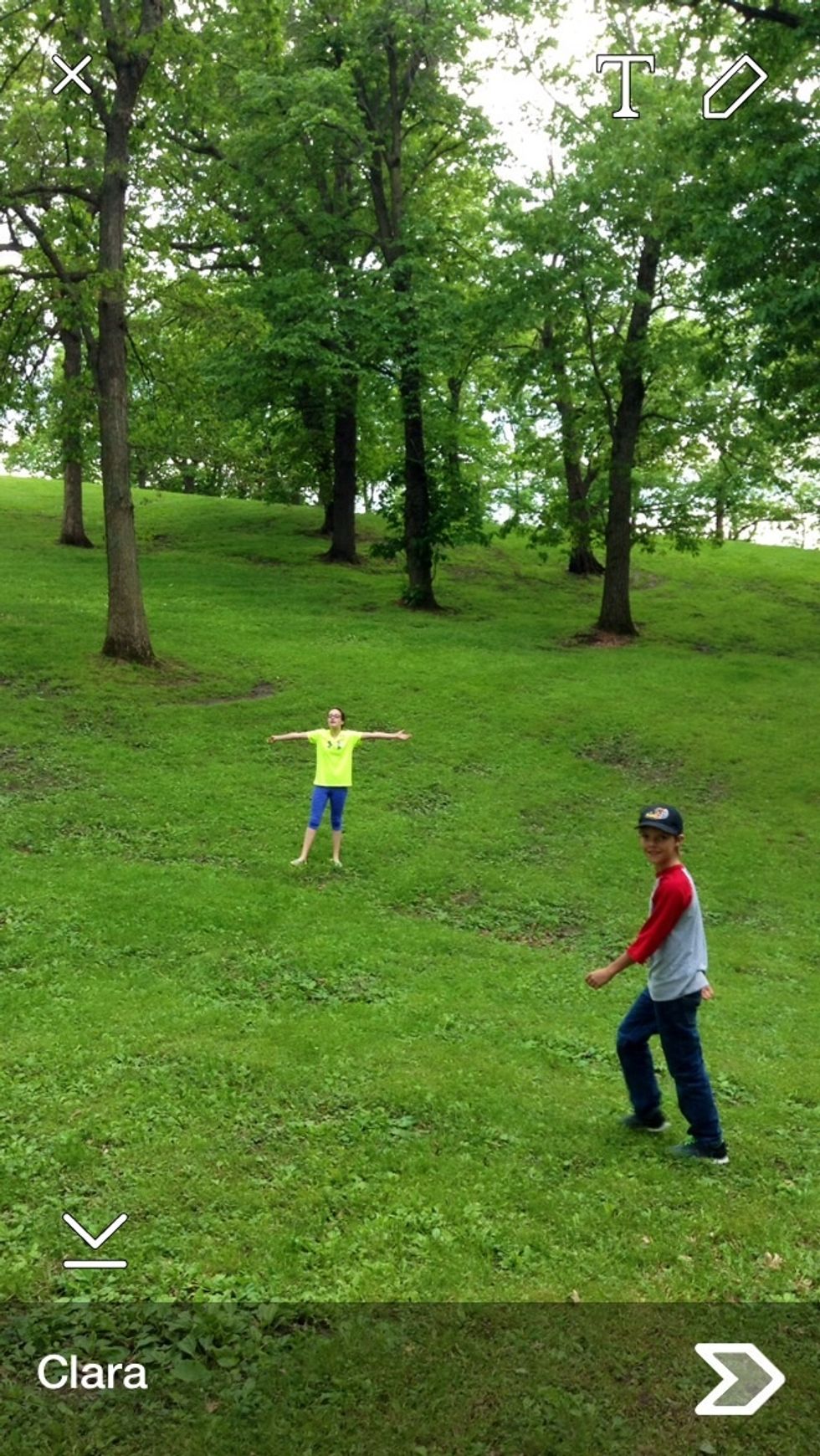 Take a picture and tap to start a caption as usual.