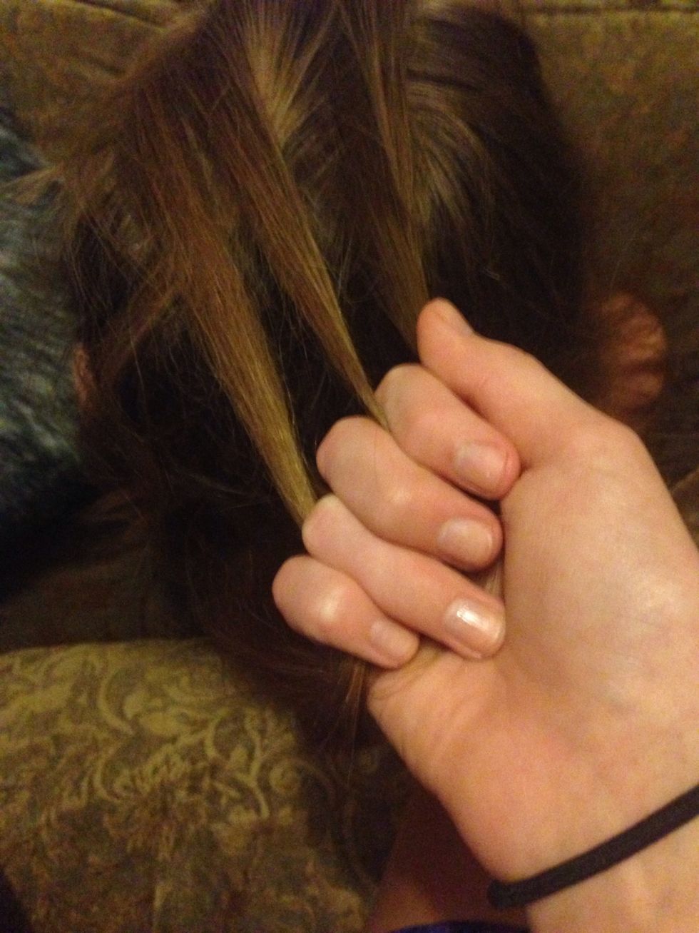 Take a piece from the front of your head (pretty thin) and bring it back to your left end piece.