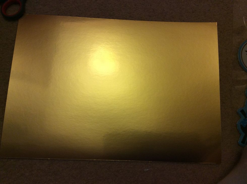Take a piece of card. I used metallic gold.