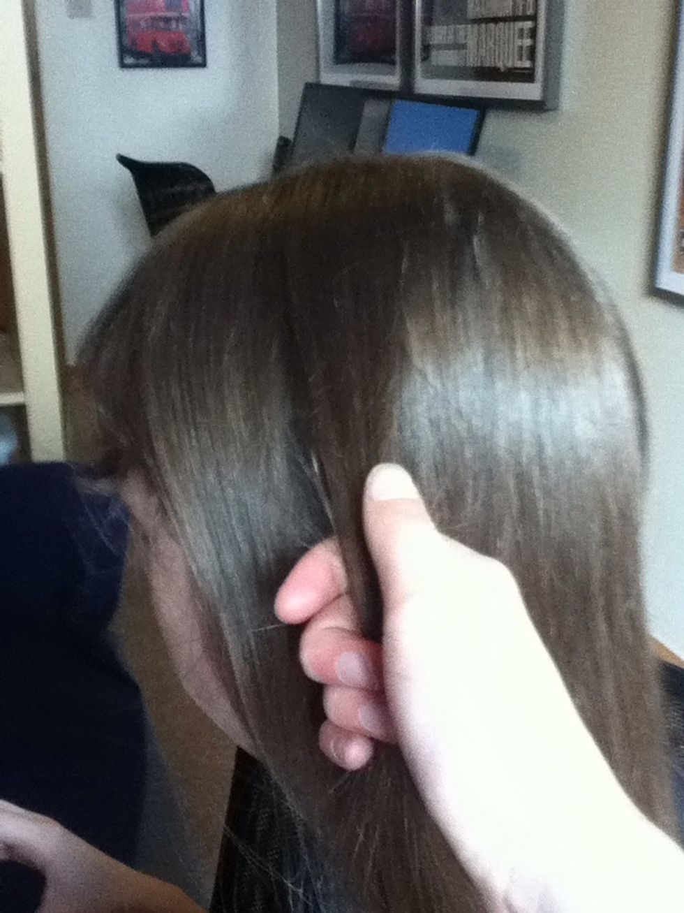 Take a piece of hair, about this size, from the top of your head.