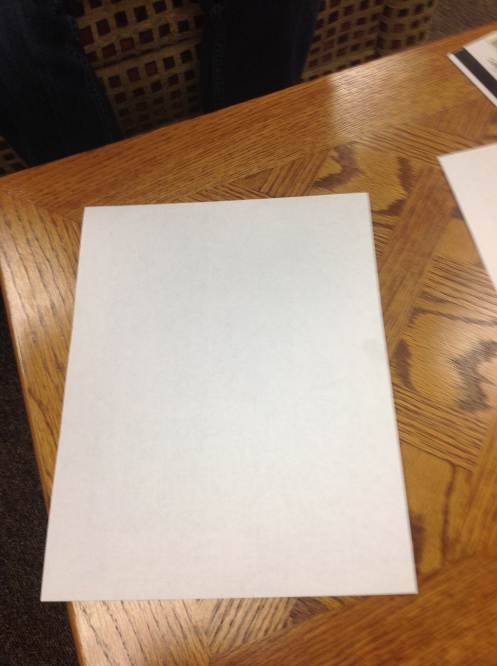 Take a regular piece of paper, any kind will work, as long as it's not square or cut out.