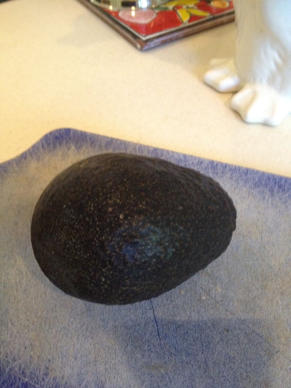 Take a ripe, but not soft, avocado.