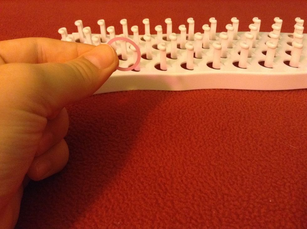 Take a rubber band any color of your choice, I am using pink as an example