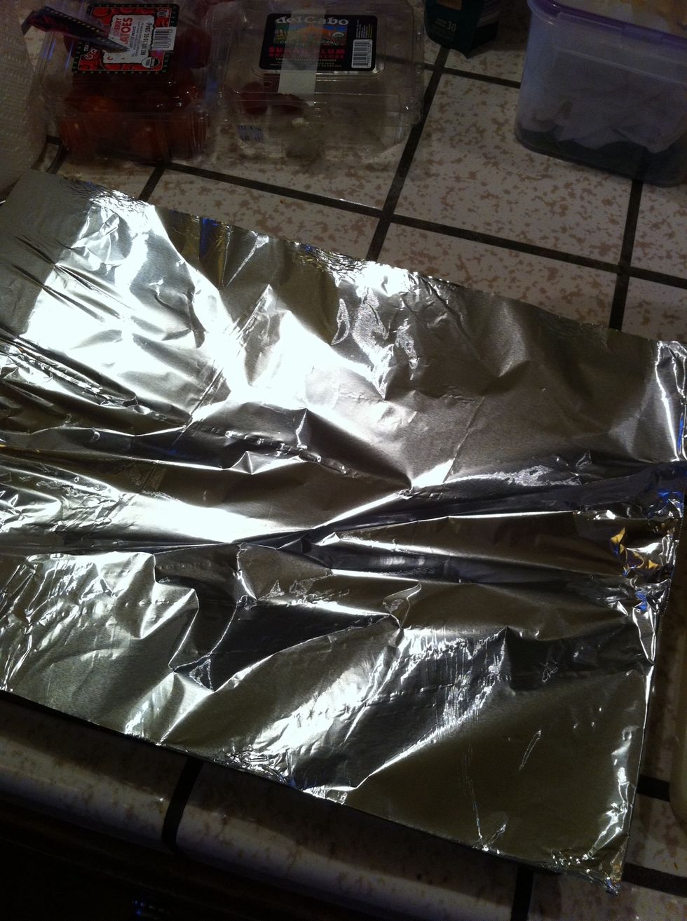 Take a sheet of foil and crumble it up.