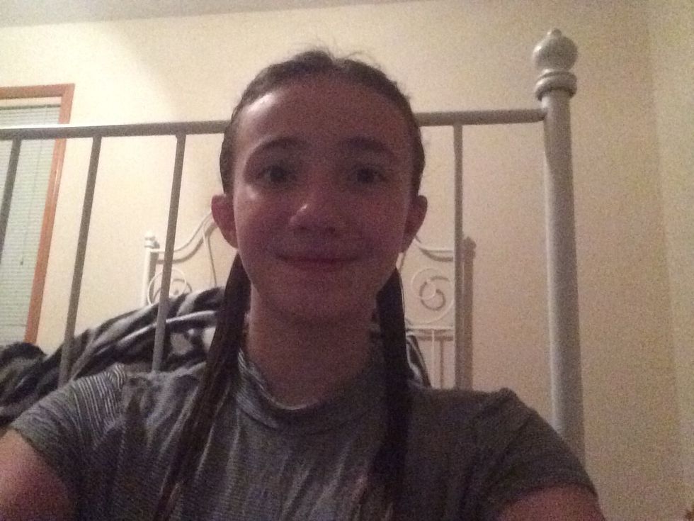 Take a shower, or get your hair really wet, and then put it into 2 ponytails.