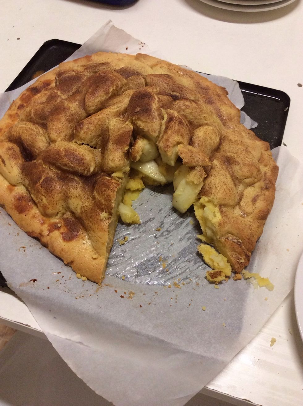 Take a slice out and serve it on a plate. The pastry should taste and have the texture of a biscuit.