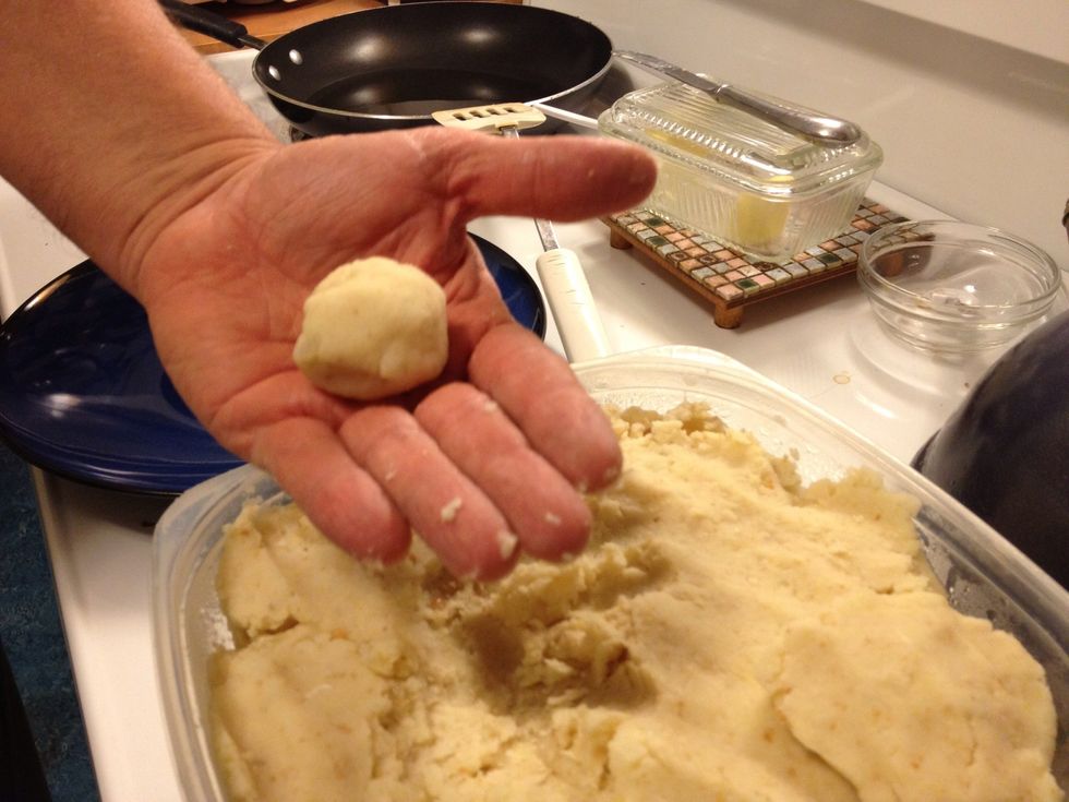 Take a small amount and roll it into a ball.