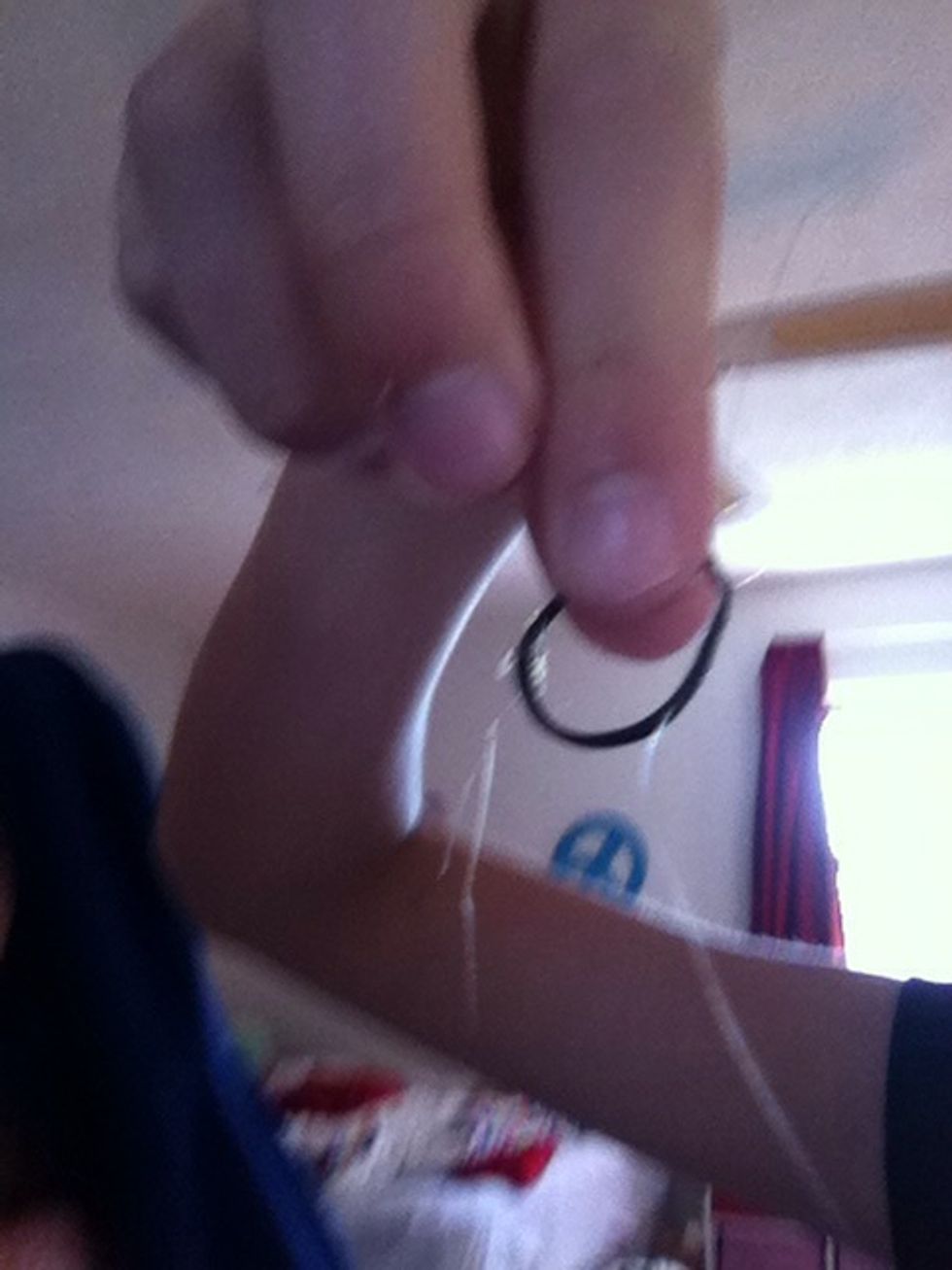 Take a small hair tie